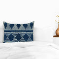 Blue Abstract Pattern Cushion Cover on the bed