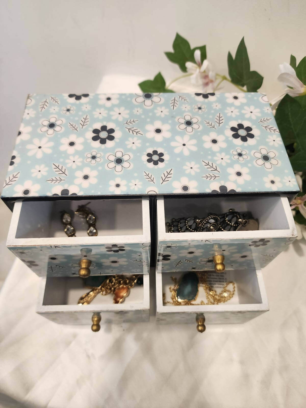 Mini Drawers light blue colour with jewelry in it