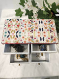 Colorful Mini Drawers with 4 Drawers are half open and watch and jewelery in it