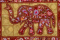 Elephant embroidered wall decor in red color with flowers design