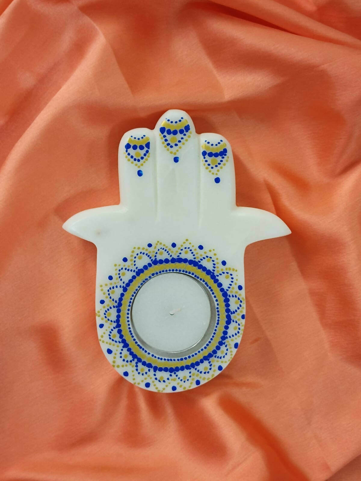 Hand painted Hamza hand blue design in it