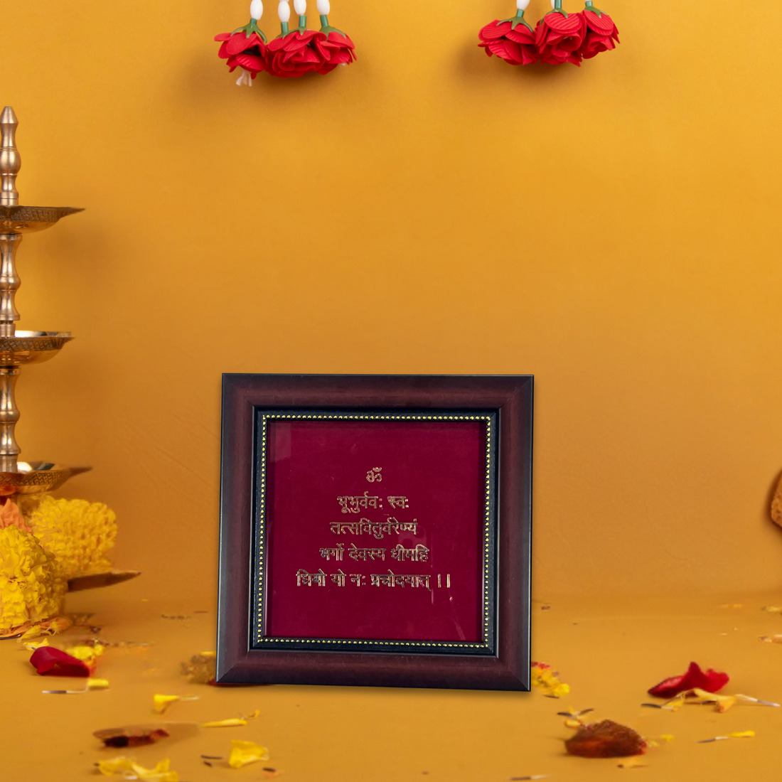 Framed text of Gayatri Mantra Photo Frameâ€‹ on a yellow background with decorative elements