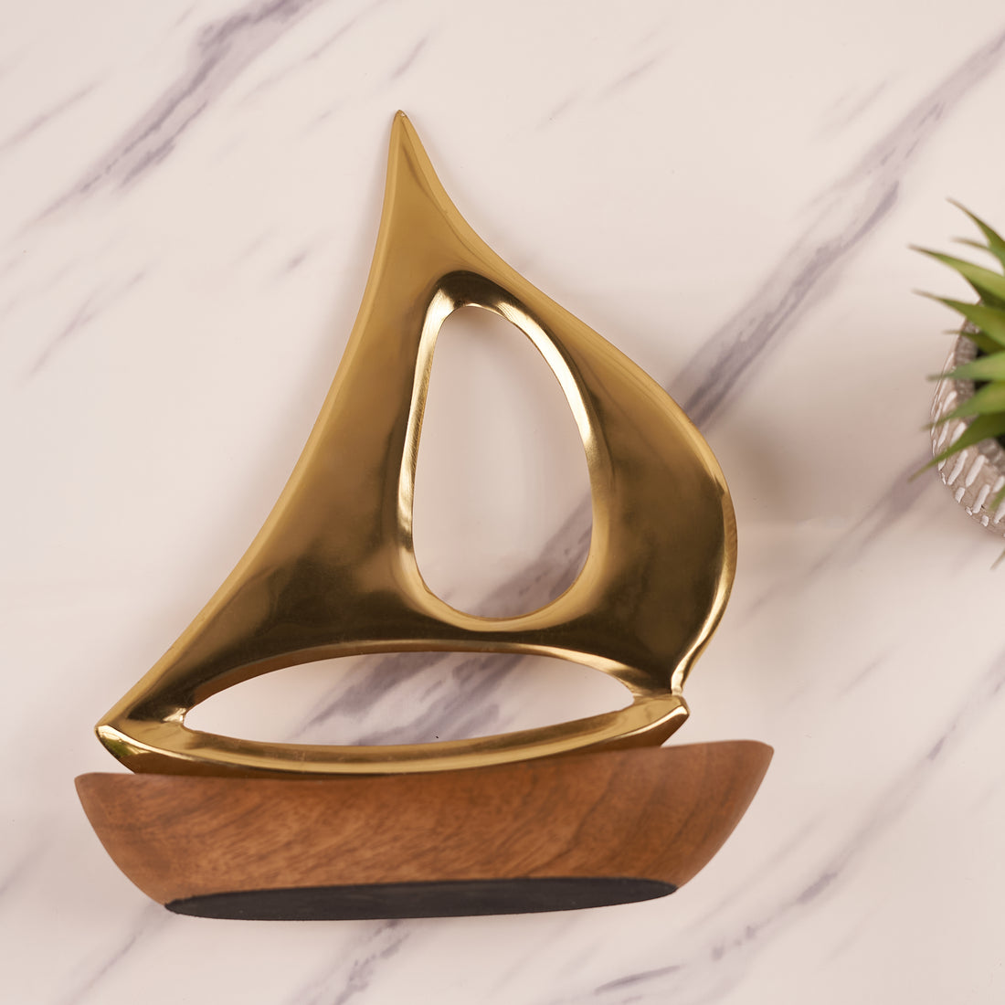 Golden Brass Boat Shaped Décor with Wooden Base – Elegant and Unique Home Accent