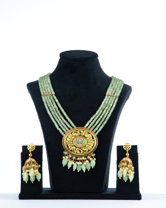 Zaariya Long Necklace with Light Green Beads and Filigree Pendant