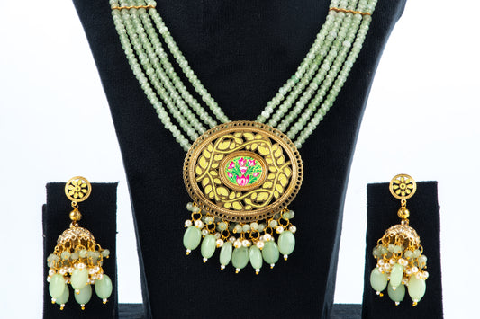 Zaariya Long Necklace with Light Green Beads and Filigree Pendant