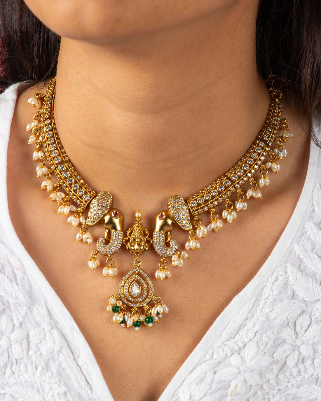 Gold-Plated temple Necklace with Elegant Elephant Detailing