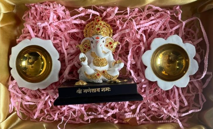 Elegant Ganesh Idol with Jewelry and 2 Stunning Marble Diya