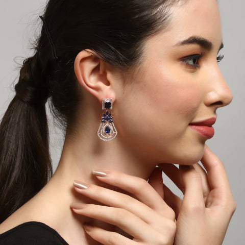 Handcrafted rose gold plated blue dangler american diamond earrings