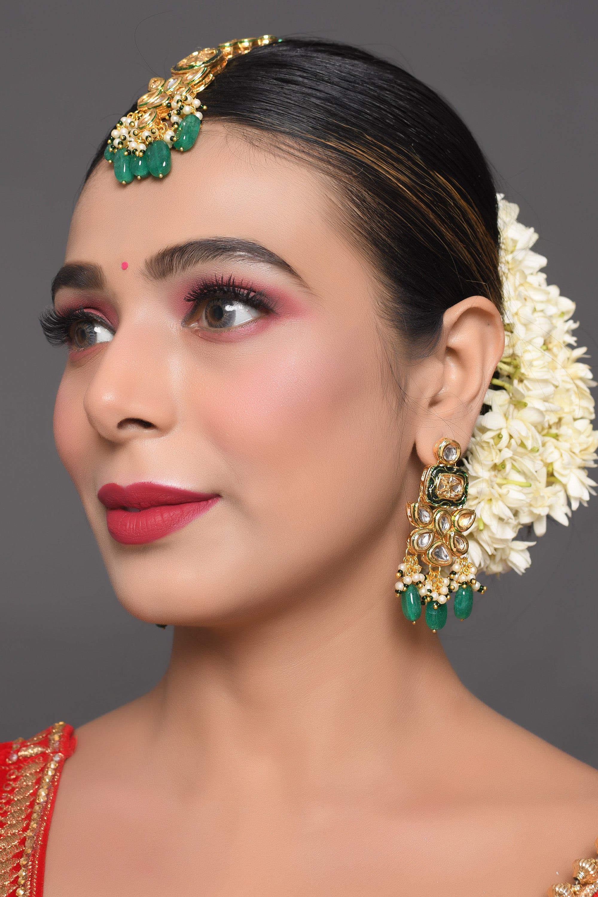 Green Gold toned Kundan earrings with Maang Tikka