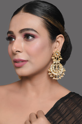 Gold toned Kundan Crescent Shaped earring