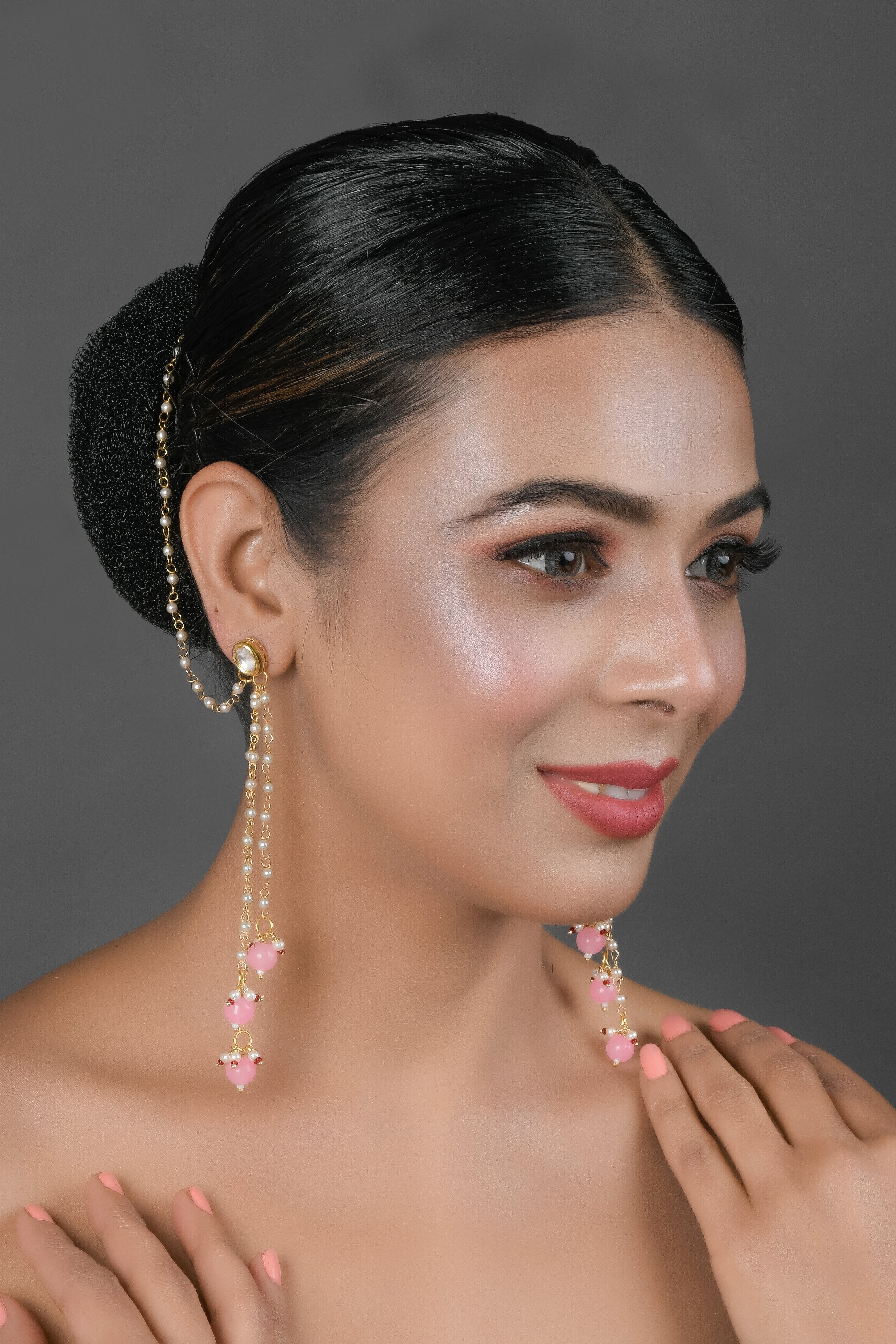 Gold Tone Kundan Inspired Pearl Tassel Earrings with Hair Chain